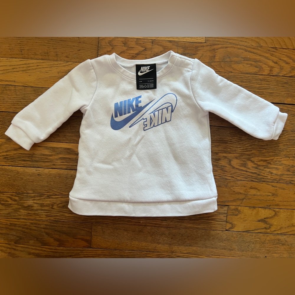 Nike girls white and purple pull over sweatshirt 12 months B1G1 50% off